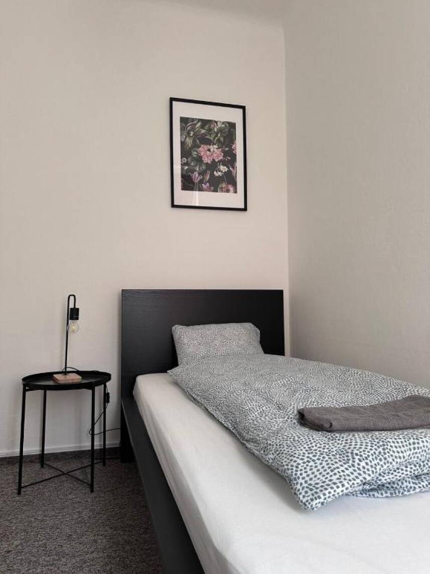 1 - Economy Triple Room with Shared Bathroom Photo 